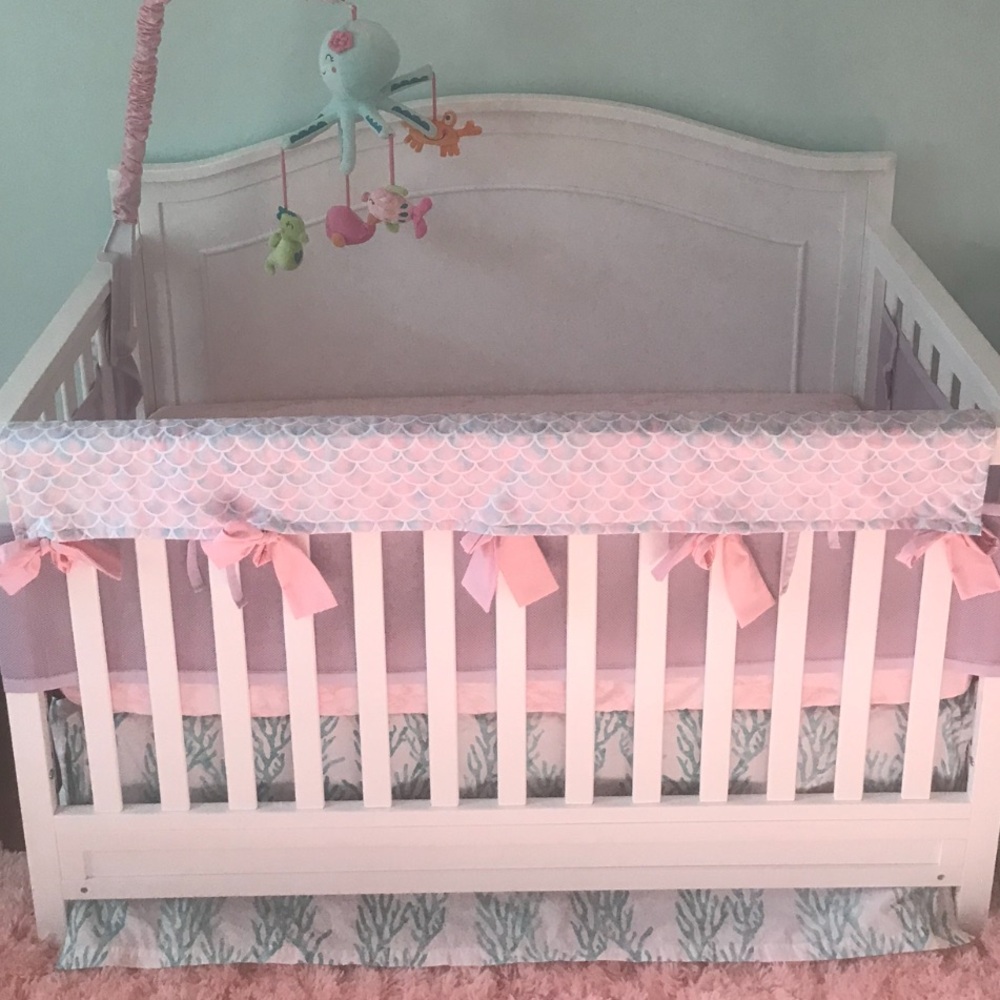 Custom crib railing cover, purple breathable crib liner, & coral crib bed skirt!